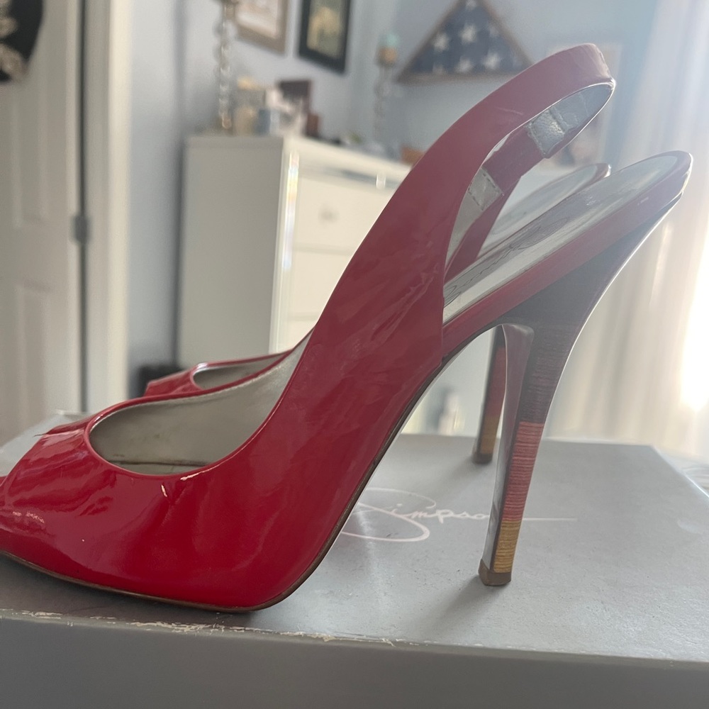 Red Jessica Simpson patent leather open toed sling backs